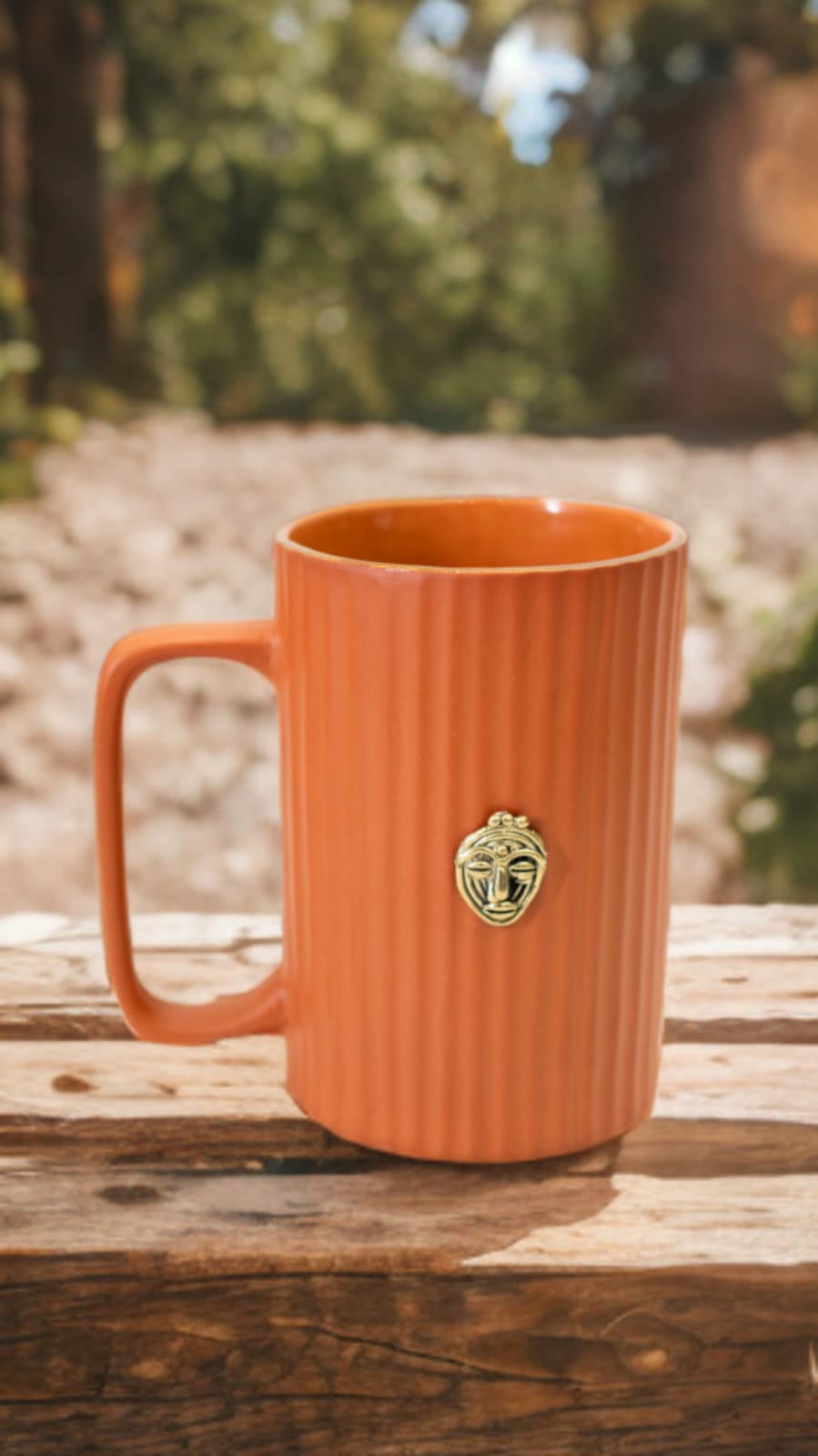 Handcrafted Terracotta Beer Mug with Brass Mask Emblem