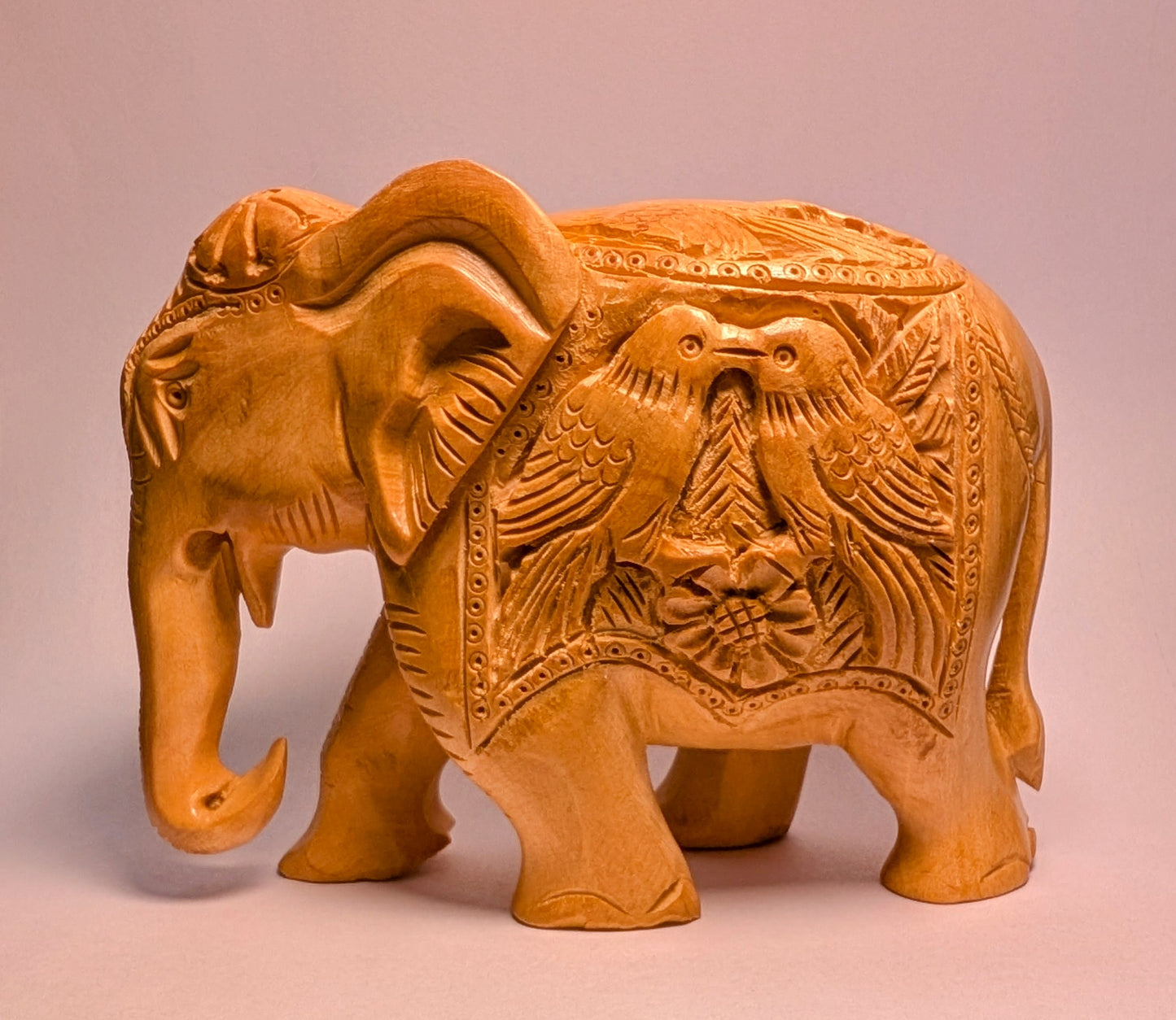Handcarved Elephant Figurine with Bird Motif