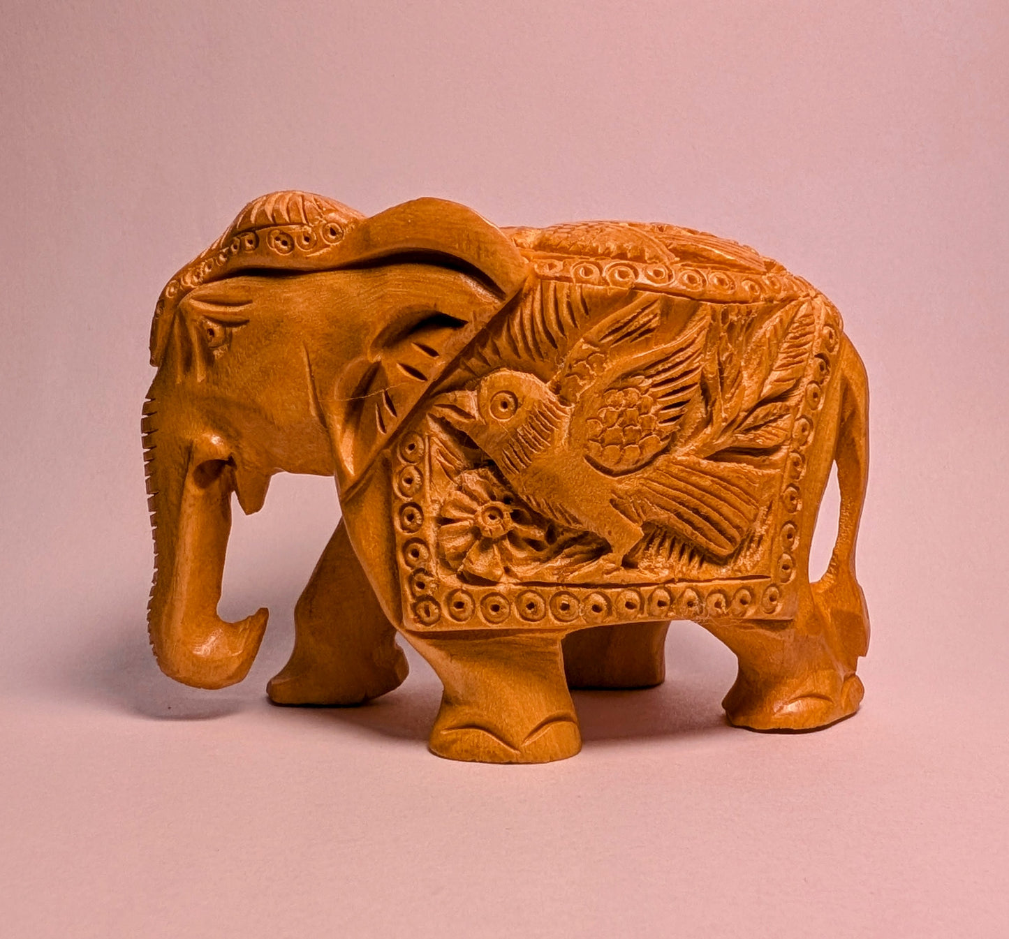 Handcarved Elephant Figurine with Bird Motif